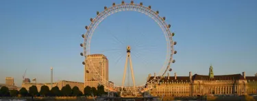 London Eye embankment view blue sky